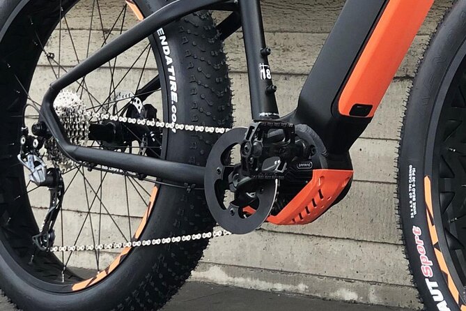 FAT TIRE E-BIKE GREAT TOUR - river, parks & panoramic views tour - Stop-by-Stop: Cernin Palace, Lennonova Zed, and the Walk to Charles Bridge