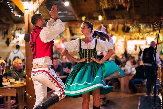Folk Dinner Experience in Prague with Transportation - Welcome drink and the traditional Czech meal