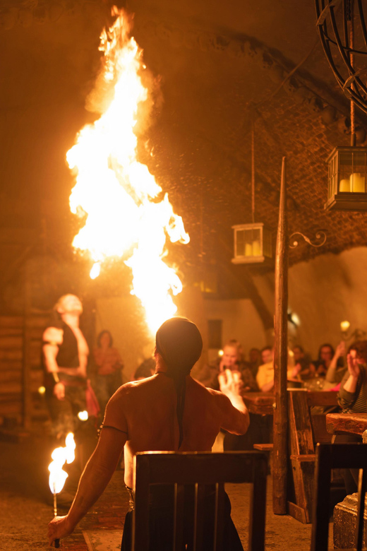 From Prague: Medieval Dinner, Show, Castle and Brewery - The medieval program: dancers, musicians, beggars, witch inquisitors, dice
