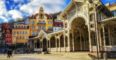 From Prague: Private Karlovy Vary & Crystal Factory Tour - Karlovy Vary’s famous spa walk: Vřídlo and 12 active springs
