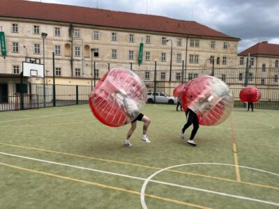 Prague: Bubbles football in city centre of Prague - Finding the Meeting Point: The Huge Brown Gate on the Long Wall