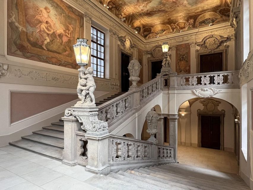 Prague: Clam-Gallas Palace Entry Ticket with Audio Guide - Climbing to the 2nd floor: Fischer from Erlach vs cramped Old Town
