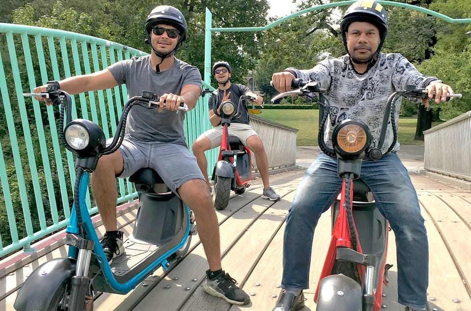 Prague Electric Scooter and eBike Grand Tour - Old Town Sights: National Theater, St. Nicholas, and Square Moments