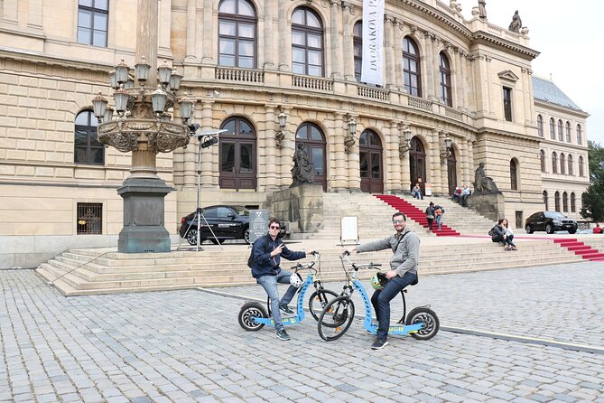 Prague Panoramic Views e-bike and e-Scooter guided Tour - Lennon Wall and Charles Bridge: cultural stops plus a photo plan