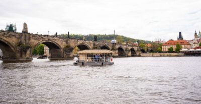 Prague: Party Tiki Boat Sightseeing Cruise with Drinks - The 90-minute route: National Theatre to Štvanice Island via Charles Bridge