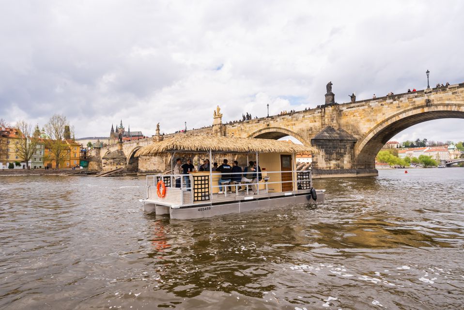 Prague: Party Tiki Boat Sightseeing Cruise with Drinks - Seating, mingling, and the guide’s role on the river