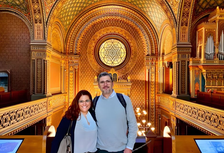 Prague: Prague Synagogues & the Jewish Cemetery Guided Tour - Meeting at Old Town Square: Cartier, the Umbrella, and Your First Steps