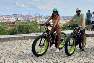 Prague Trike & e-Scooter Tour: Castle Viewpoints & Charles Bridge - Lennonova zed and Charles Bridge: the fast-photo Prague combo