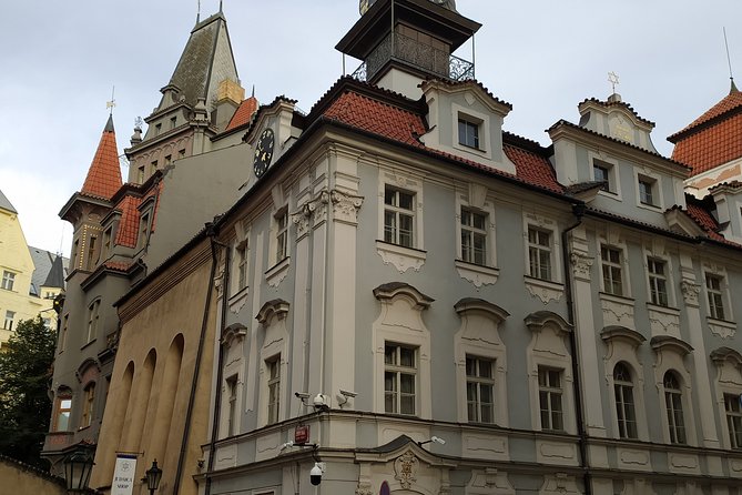 Religious Prague Walking Tour - Stop 4: St. Michael Church Prague and St. Nicholas for Important, Contrasting Narratives