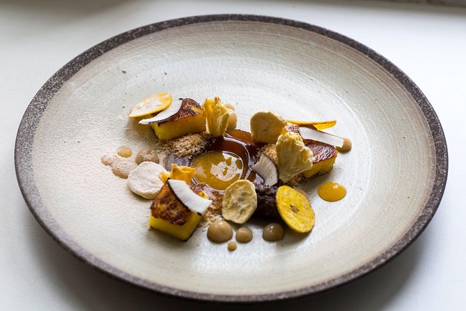 Savor 10 Course Dinner in Chef’s Kitchen - What the evening feels like: candles, one-on-one service, and course pacing